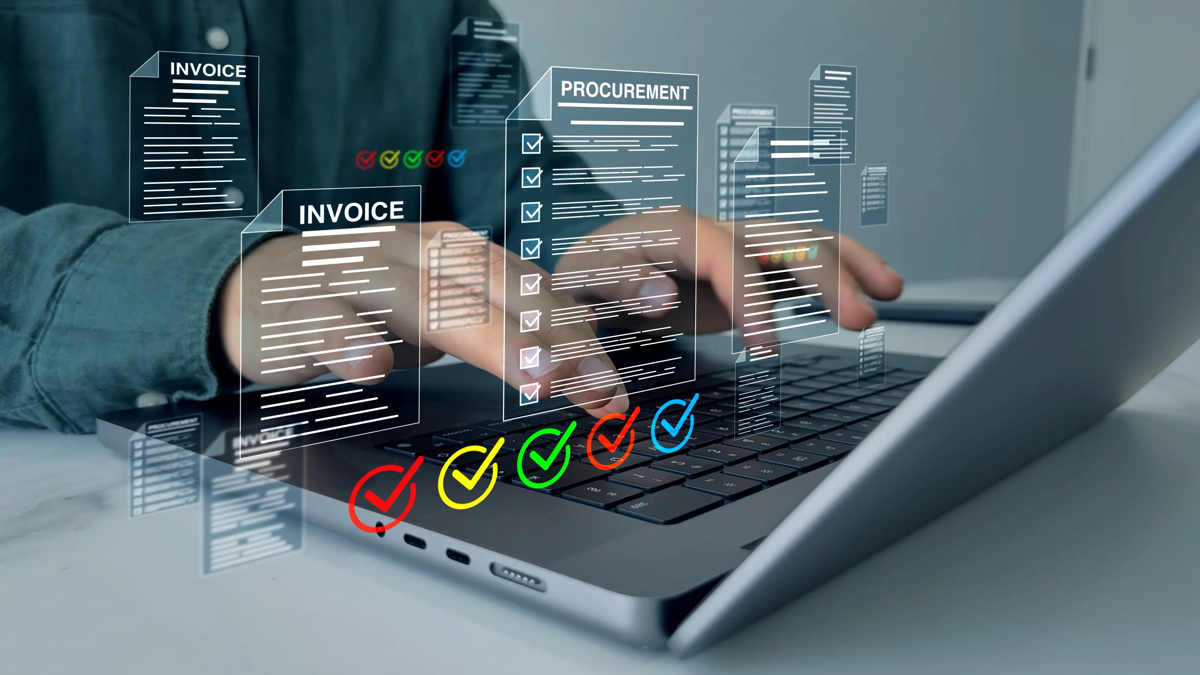 A person processing invoices and procurement documents on a laptop.
